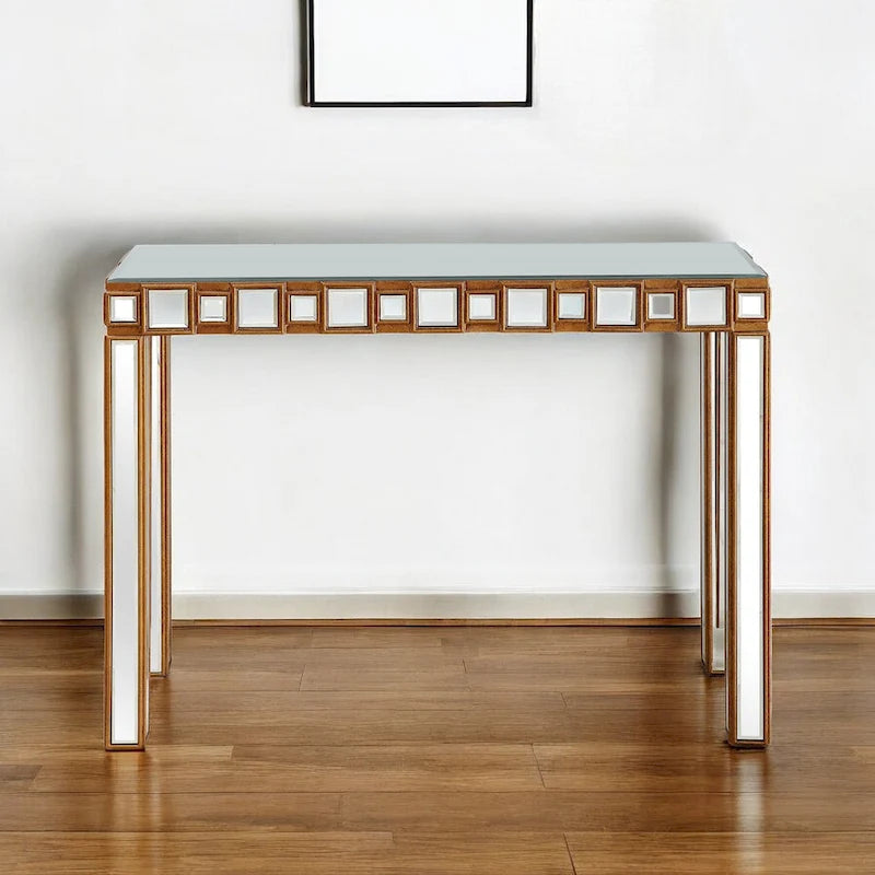 Console rectangulaire dorée à miroir et piètement en verre à quatre pieds - 43 cm L x 14 cm l x 31 cm H
